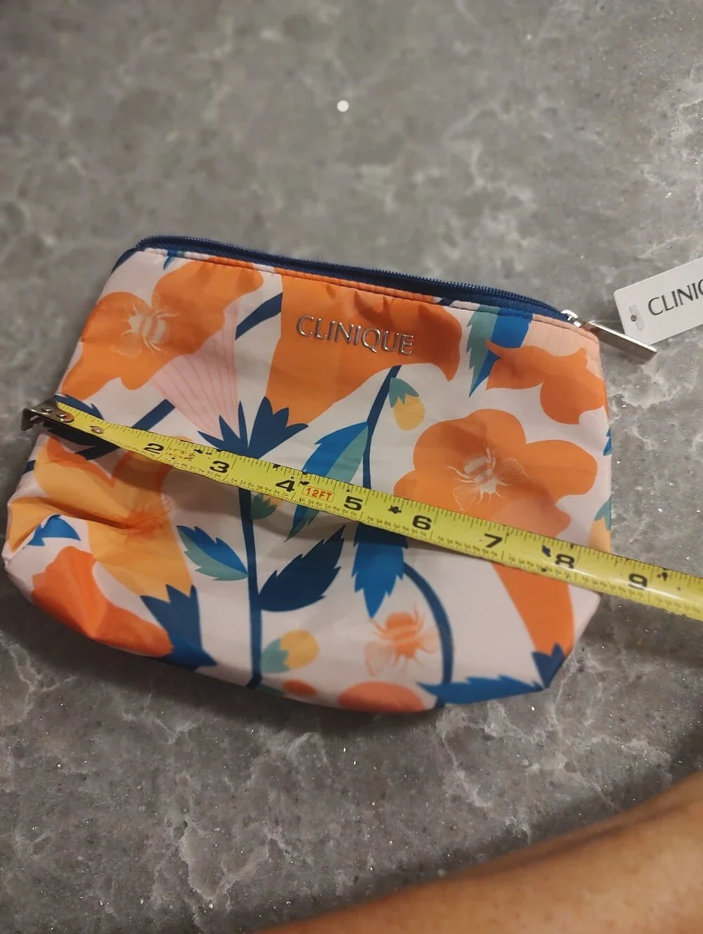 Clinique New with tags cosmetic bag pretty orange/blue